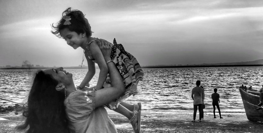 Parent and child by Chirag Nayak on Unsplash